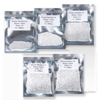 three bags of white powder with labels on them