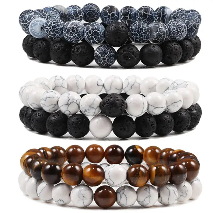 a set of three bracelets with marble beads