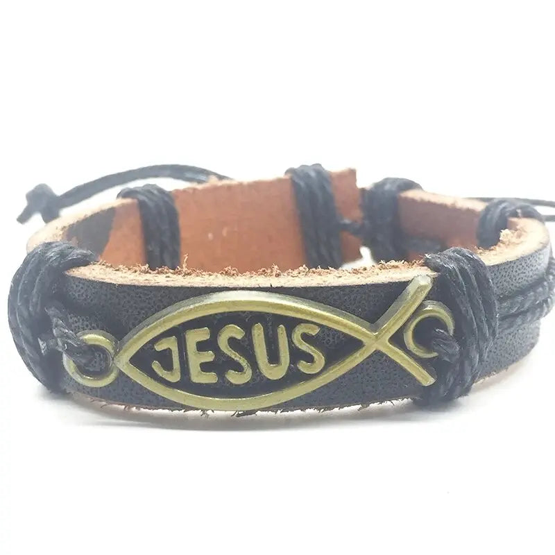 a black leather bracelet with a gold jesus fish charm