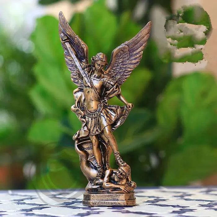 a figurine of an angel on a table