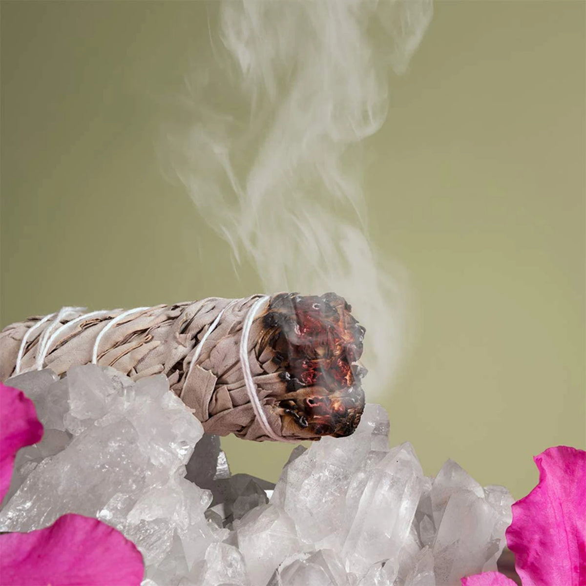 smoke coming out of a bottle sitting on a pile of ice