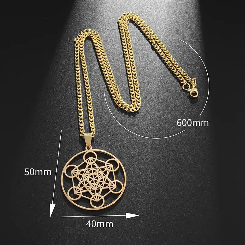 a gold necklace with a flower on it