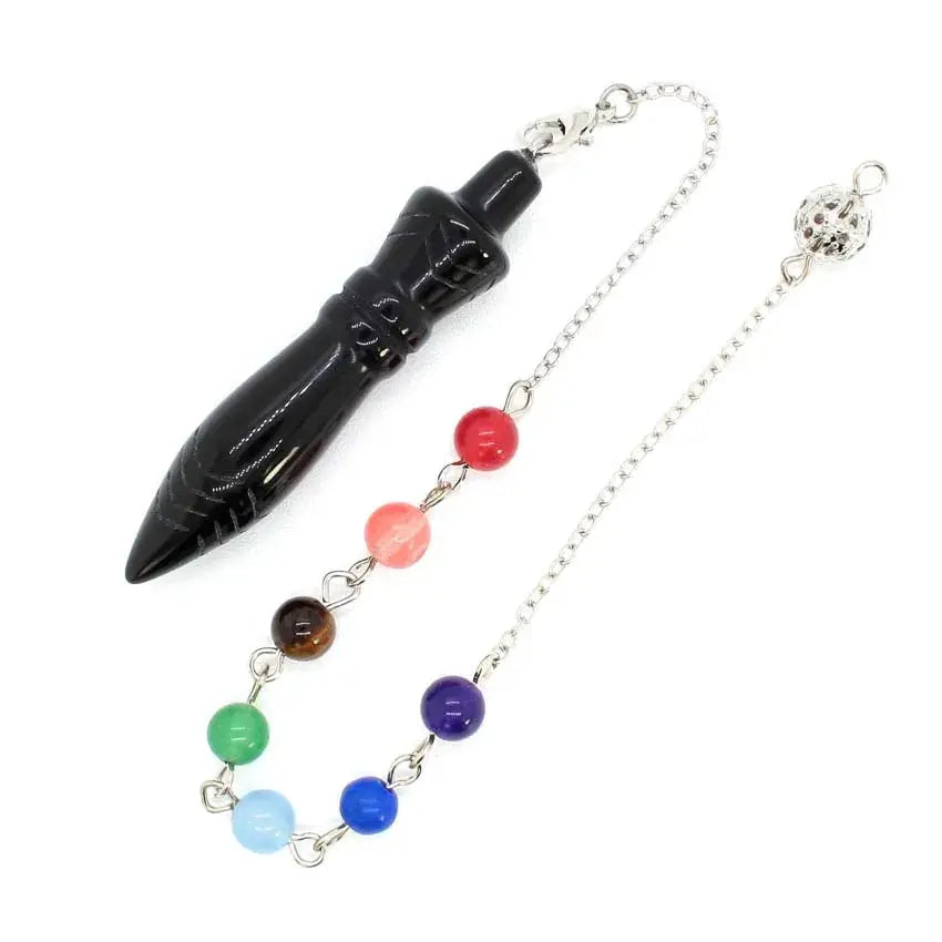 a necklace with a pen and seven chakras on it
