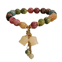 a multicolored bracelet with charms and charms