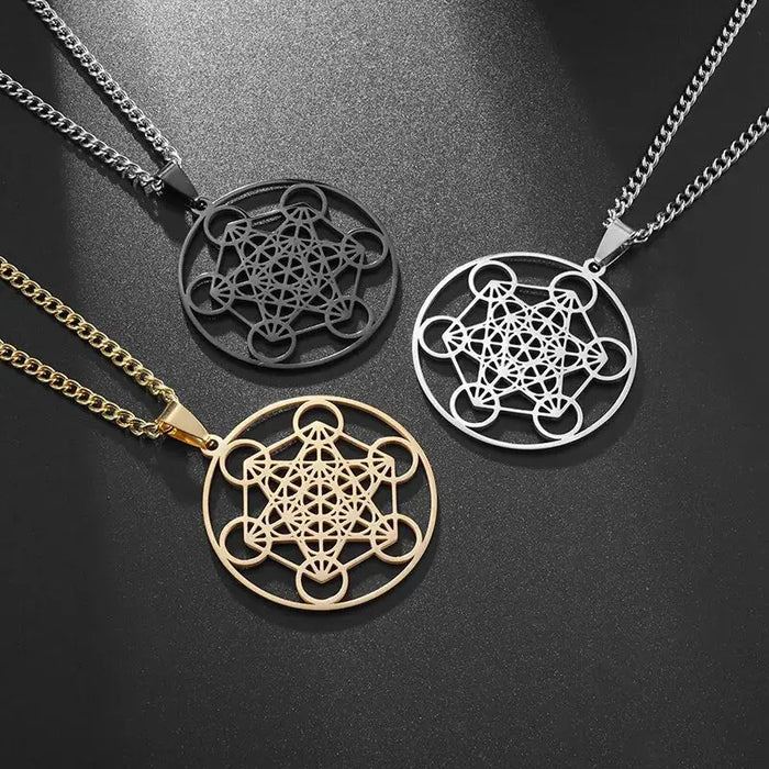 three different styles of pendants on a black surface