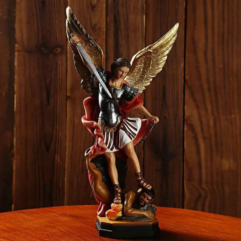 a figurine of a woman with a sword on a table