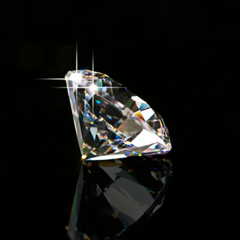 a diamond is shown on a black surface