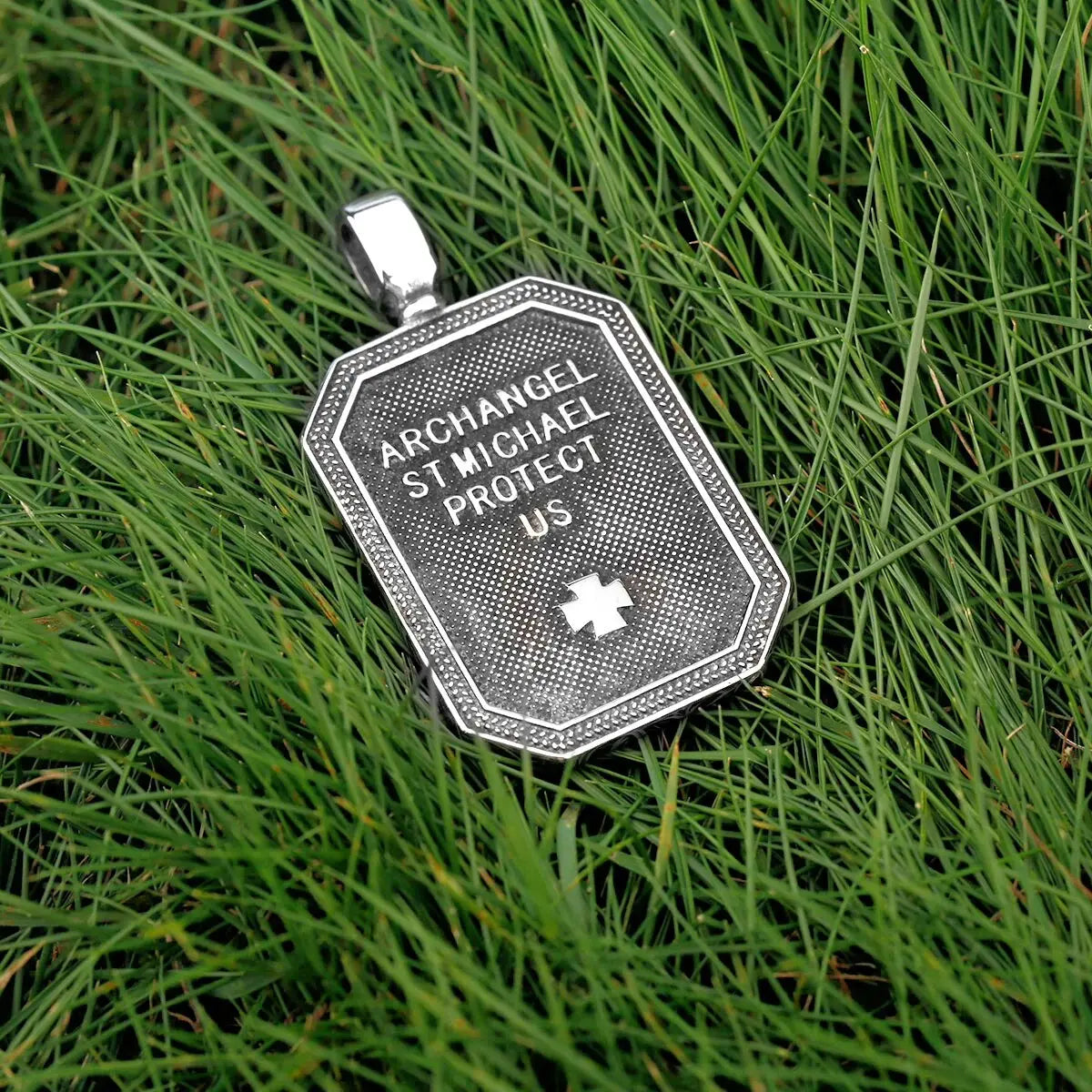 a tag that is sitting in the grass