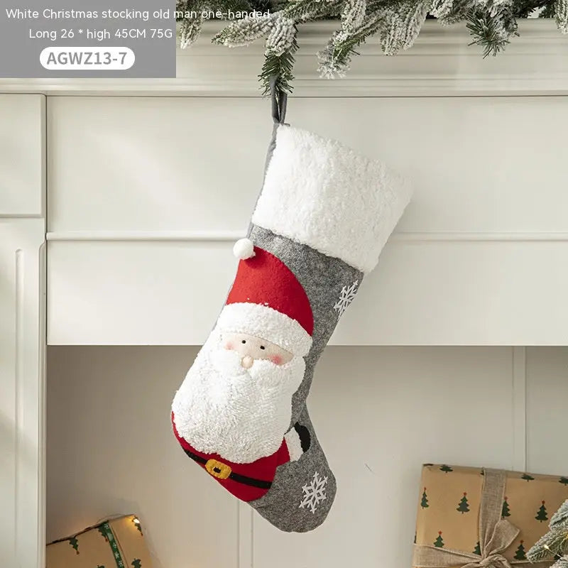 a christmas stocking hanging from a mantel